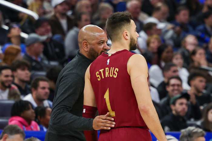 Dec 11, 2023; Orlando, Florida, USA; Cleveland Cavaliers head coach J.B. Bickerstaff talks to guard Max Strus (1) during the second half against the Orlando Magic at Amway Center. Mandatory Credit: Mike Watters-USA TODAY Sports